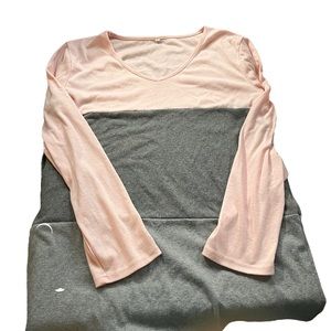 Pink and gray sweater.